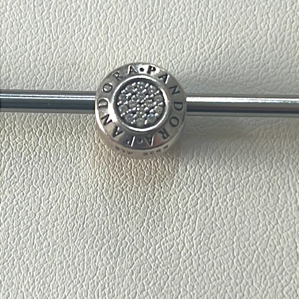 Retired Pandora Sterling silver CZ signature charm